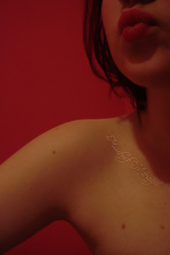 white ink tattoo on black people sparrow tattoo on hip