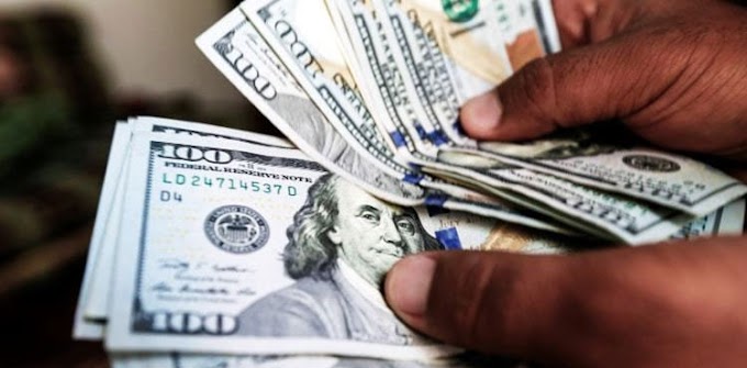 US dollar falls below Rs154 against rupee