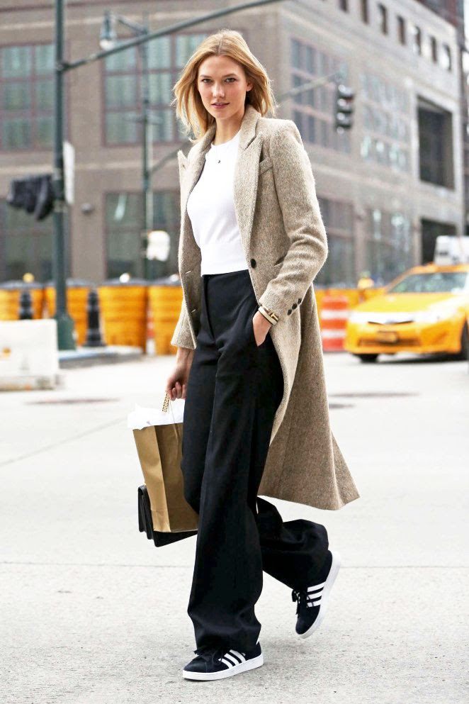 Le Fashion Blog Model Off Duty Karlie Kloss Fall Winter Style Tweed Textured Tan Coat Cropped Sweater Wide Leg Pants Adidas Gazelle Sneakers