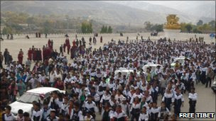 Students marching to centre of Rongwo Town at the gate of Rongwo Monastery 19 October