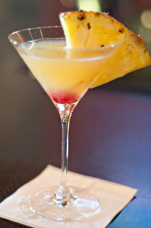 Pineapple Upside-down Cake Martini Ingredients: 2 ounces wedding cake vodka (trust me – this stuff is good!) 1 ounce pineapple juice 1 drop grenadine syrup pineapple & cherry for garnish