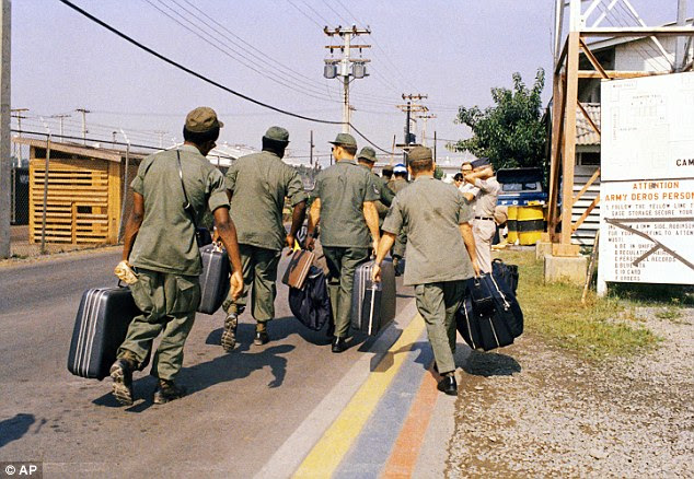 Exit: In this March 29, 1973 photo, Camp Alpha, Uncle Sam's out processing center, was chaos in Saigon. Lines of bored soldiers snaked through customs and briefing rooms