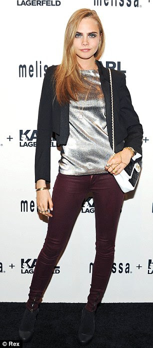 Model behaviour: Clearly being surrounded by other beauties was enough to spur Cara on to make the extra effort