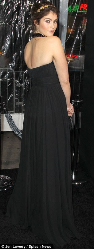 Stealing the spotlight: Gemma showed off her dress from the back