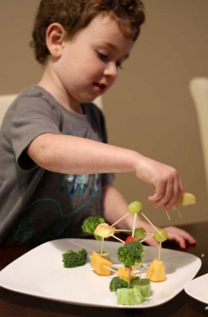 Encourage healthy snacking with fruit and veggie building for kids.