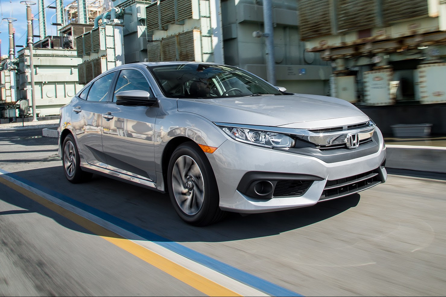 2016 Honda Civic EX front three quarter in motion 04