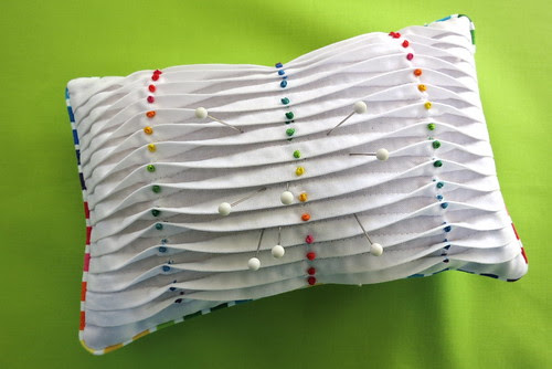"Almost big enough to be a pillow pleated pincushion"