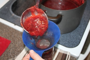 Pour into hot mason jars to begin the canning process.