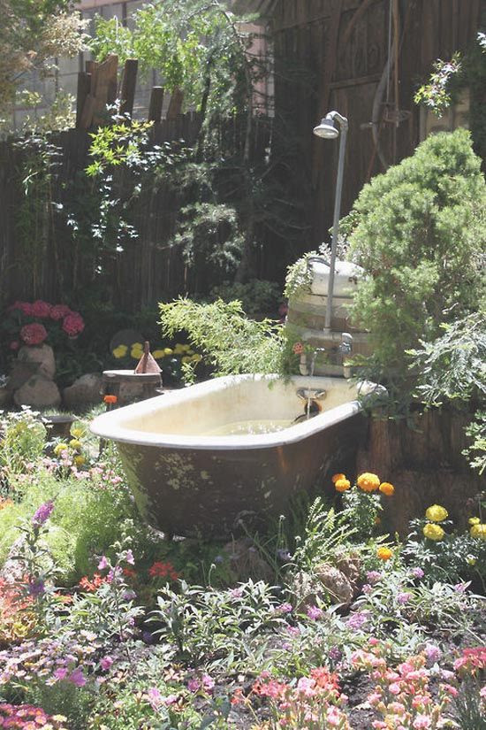 A bath in the garden is the latest must-have; making baths in bedrooms so last season. #bath #garden
