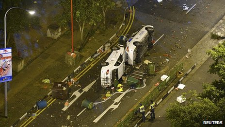Police cars overturned in Singapore. 8 Dec 2013