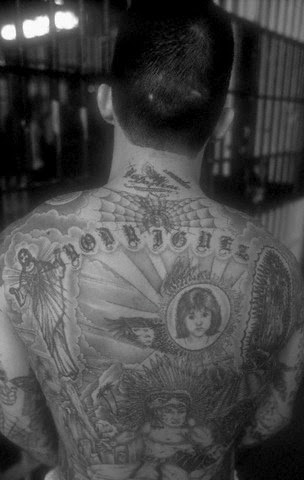 Orange County Jail - Inmate with gang tattoos: Latin Kings ( Stomach - crown