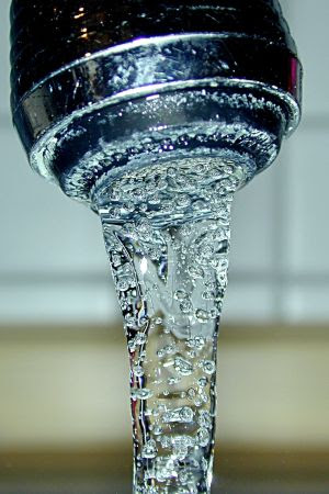 Close-up of tap water