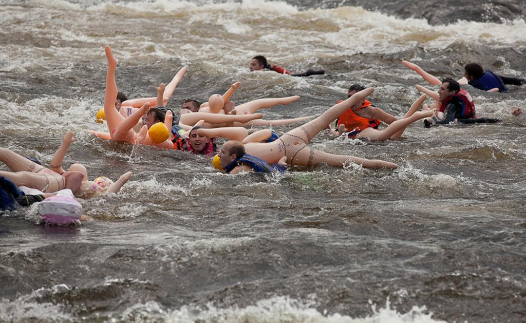 Swim in rubber women.  The goal - to swim in inflatable dolls through water rapids.  (Dmitry Sumin)