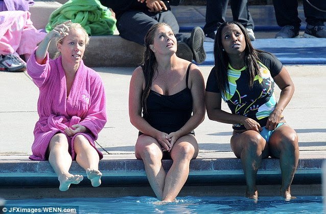 The view from above: The ladies let their intense diving focus lapse momentarily