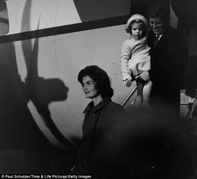 Family of the White House: Three days after the election, JFK and Jackie disembark from a plane with their daughter Caroline in Washington DC on November 11, 1960