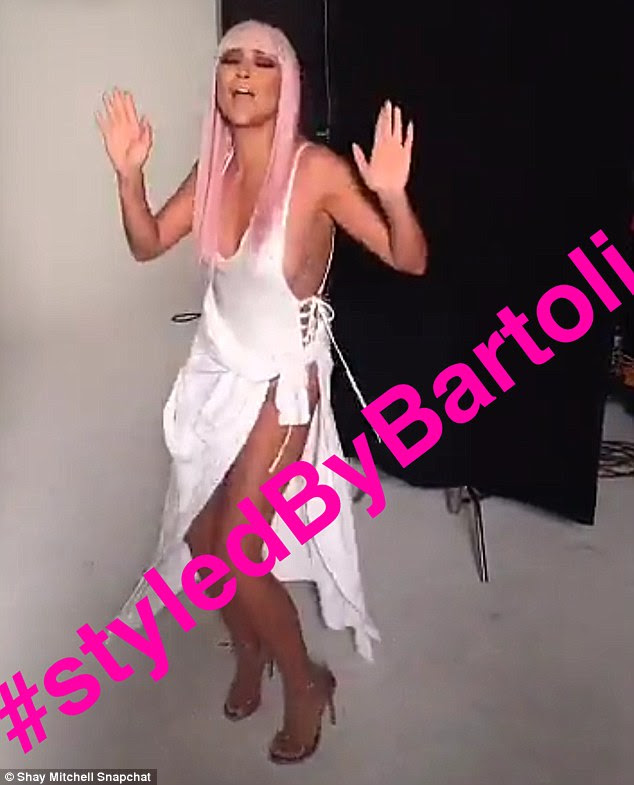 White hot! Shay lip-synced to Drake's One Dance while posing up a storm in a revealing top with lace-up sides