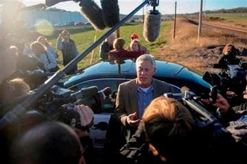 (AP Photo/Columbia Daily Tribune, Nick Schnelle). Bill Ferguson, center, speaks with members of the media about his his son's pending release from prison on Tuesday, Nov. 12, 2013 near the Jefferson City Correctional Center in Jefferrson City, Mo.