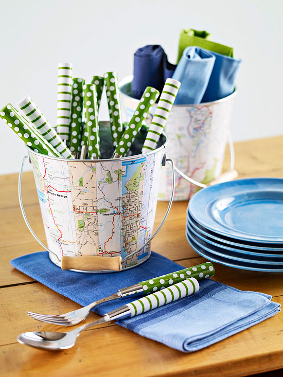 Buckets covered in old map pieces