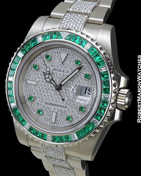 The very beautiful prong setting shows off each and . ROLEX SUBMARINER 18K WHITE GOLD BAGUETTE EMERALD BEZEL PAVE...
