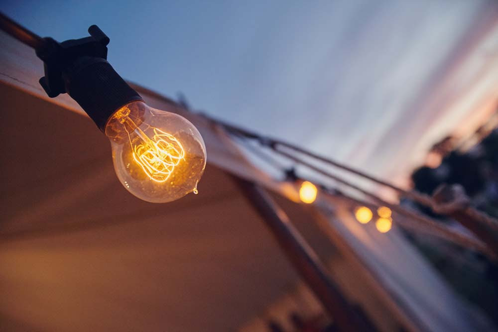 Cool lights on Marquee at outdoor wedding in Cambridge - www.helloromance.co.uk
