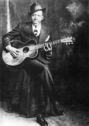 Robert Johnson, an influential Delta blues mus...