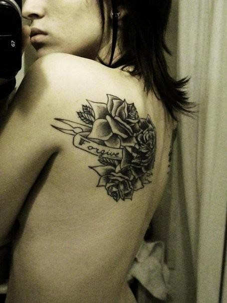 This is my friend Lexi's tattoo. It covers her hatchet man tattoo she 
