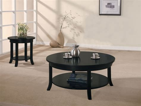 The straight, simple lines of the metal give the furniture a graphic expression and put an attractive frame around all your personal things. Black Coffee Table Design Images Photos Pictures