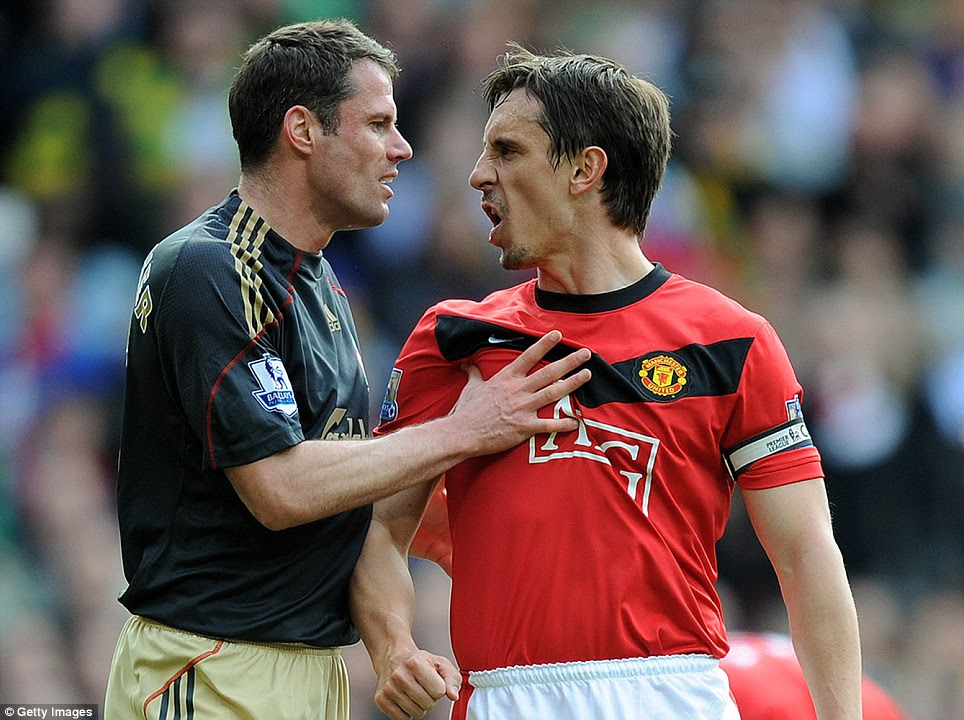 Exchange of views: Jamie Carragher and Gary Neville, now colleagues here at Sportsmail, argue in 2010. More of Mr Neville later...