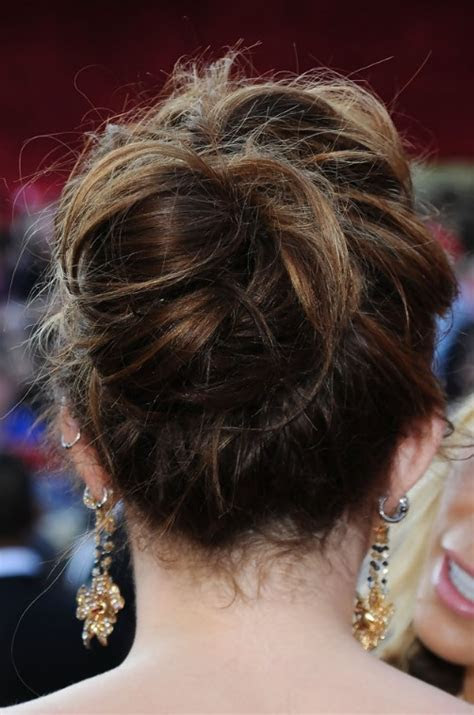 miley cyrus romantic loose bun updo wedding
