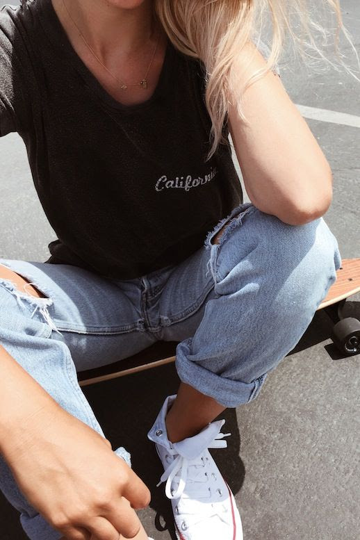 Le Fashion Blog Casual Blogger Style Dainty Gold Necklace Black Embroidered Tee Distressed Boyfriend Denim White High Top Converse Sneakers Via Mija