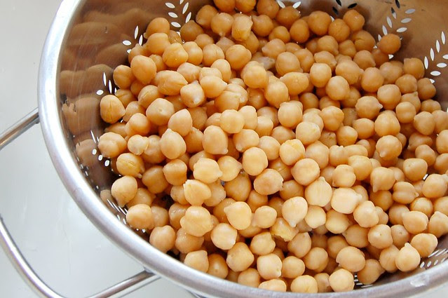 Chickpeas draining in colander in sink by Eve Fox, Garden of Eating blog copyright 2011