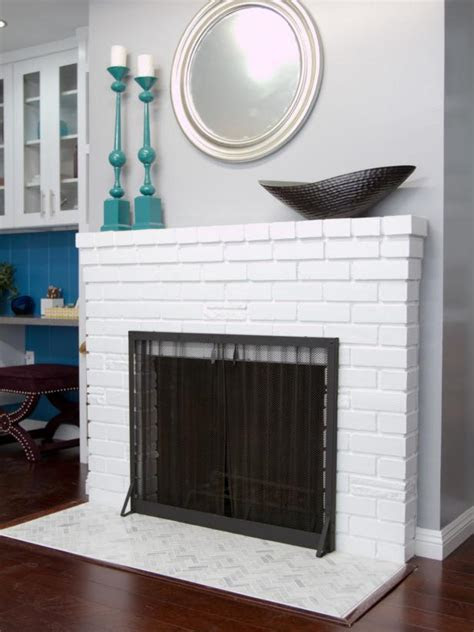 By lindsey mather the fashion world might declare white. White Painted Brick Fireplace With Herringbone Tile Hearth