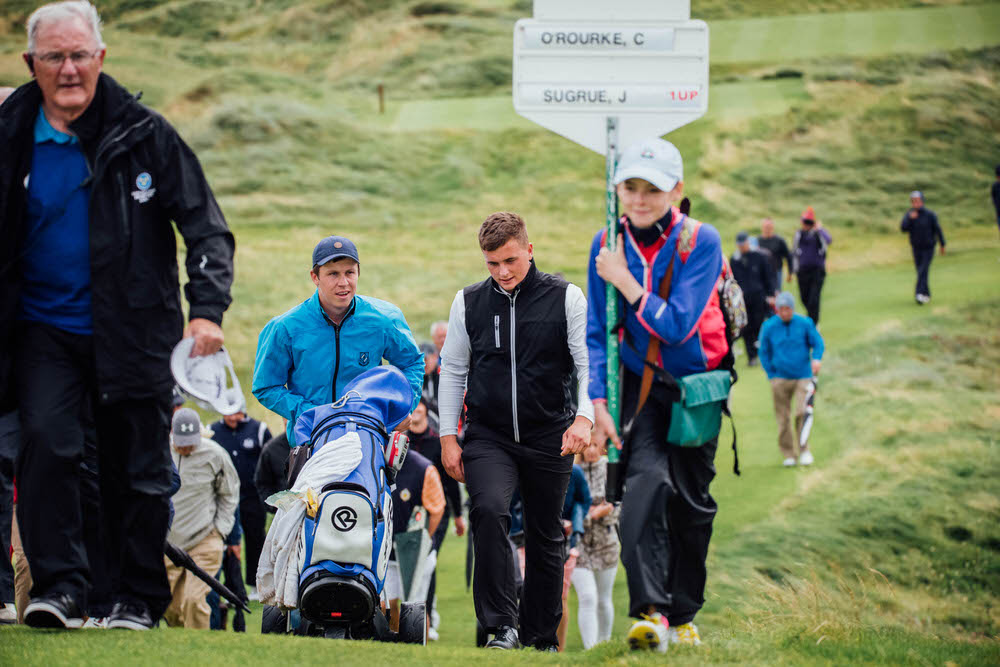 James Sugrue (Mallow) and his caddie Mark MacGrath (Lahinch/Limerick) during the final of the South of Ireland Golf Championship in Lahinch. Picture © Brian Arthur