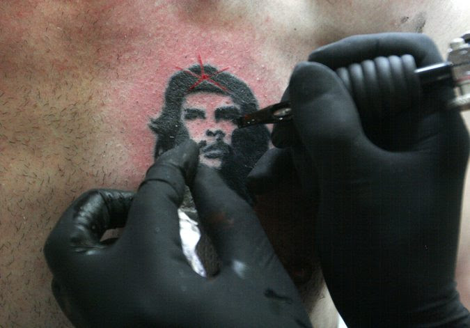 A man has an image of the late rebel hero Ernesto "Che" Guevara tattooed