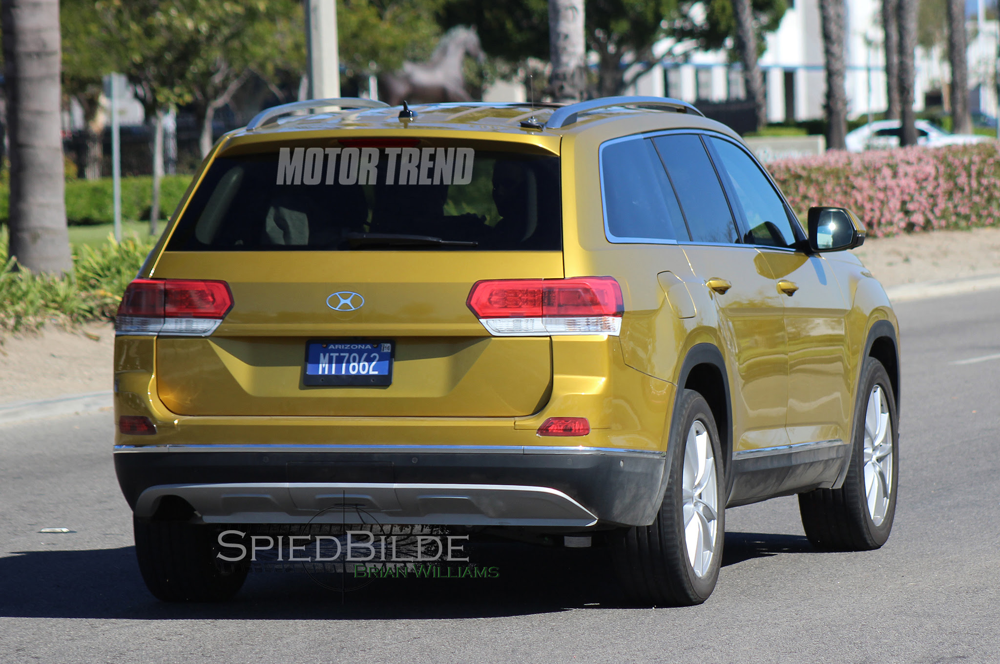Volkswagen Three Row Crossover prototype rear three quarter in motion 03