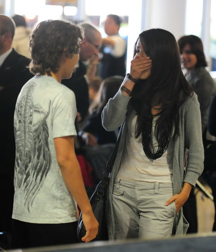 Selena Gomez And Co-Star Jake Austin Stay Close At LAX