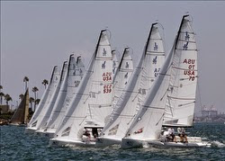 J/70 sailboats- sailing off start