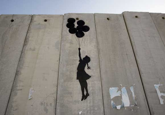 british graffiti artist banksy. The British street artist