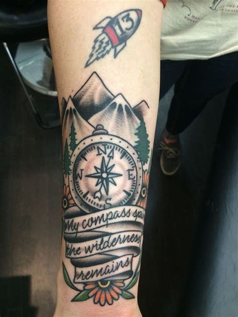 tattoo  compass spins  wilderness remains