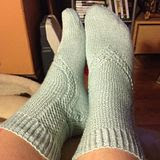 Pair 5, Pattern: Glass SlippersYarn: Yarnscape Dance in Icicle