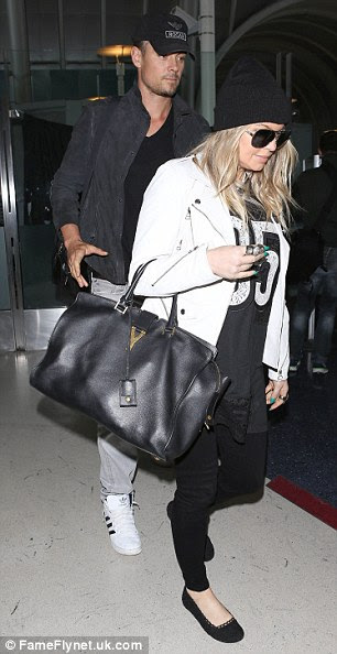 Inspiration: While in Brazil, Fergie accepted amfAR's Award of Inspiration for her continuing dedication to battling AIDS 