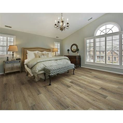 Vinyl plank flooring is a durable choice for home flooring. SMARTCORE Ultra Woodford Oak | Luxury vinyl plank, Vinyl
