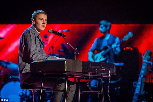 Hopeful: Ryan Green, 17, plays the piano as he sings to impress the judges on The Voice