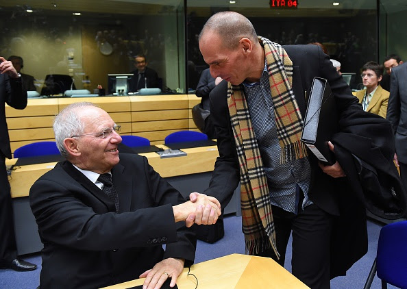 Greek Finance minister Yanis Varoufakis (R) shakes hands with German Finance Minister Wolfgang Schauble during an emergency Eurogroup finance ministers meeting at the European Council in Brussels on February 11, 2015. Proposals by the new government in Athens to renegotiate the terms of its massive international bailout are scheduled to be discussed by eurozone finance ministers in Brussels on February 11 and 12. AFP PHOTO / EMMANUEL DUNAND (Photo credit should read EMMANUEL DUNAND/AFP/Getty Images)
