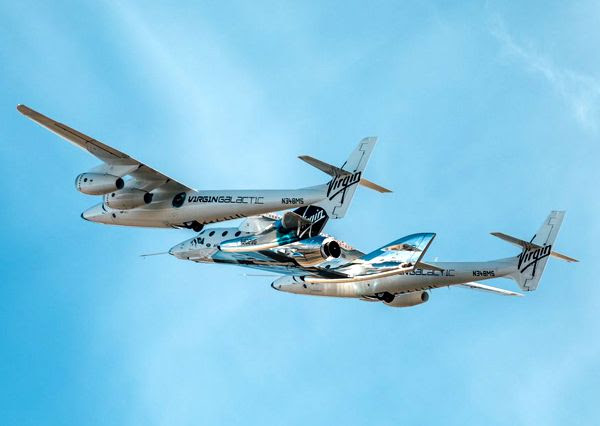 VSS Unity rides under the belly of White Knight II during Unity's twelfth test flight above California's Mojave Desert, on April 5, 2018.