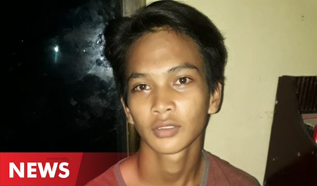 Andi Sendriaji pemilik akun Facebook Wawan Spocil saat diamankan Polisi