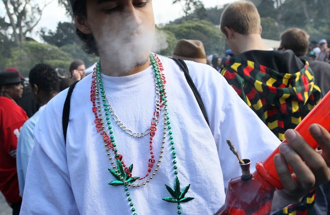 SAN FRANCISCO - APRIL 20: A marijuana user smokes from a bong during a 420 Day celebration on "Hippie Hill" in Golden Gate Park April 20, 2010 in San Francisco, California. April 20th has become a de facto holiday for marijuana advocates, with large gatherings and 'smoke outs' in many parts of the United States. Voters in California will consider a measure on the November general election ballot that could make the State the first in the nation to legalize the growing of a limited amount of marijuana for private use. (Photo by Justin Sullivan/Getty Images)