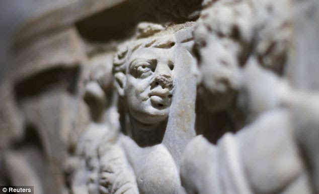 A marble low-relief decorating a sarcophagus is pictured inside the catacomb of Priscilla in Rome