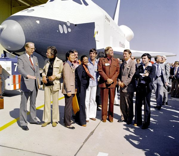 The original cast members of STAR TREK pose in front of the prototype space shuttle Enterprise at her Palmdale manufacturing facility in California...in 1976.