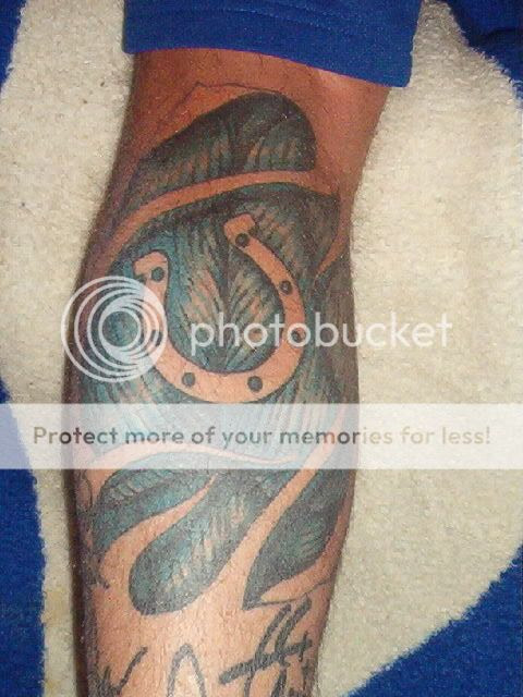 Filed under Black and Grey tattoos, Foot, Horseshoe, vine